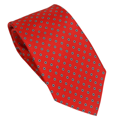 Cravatta in seta italiana al 100% rosso brillante con motivo floreale a pois blu
