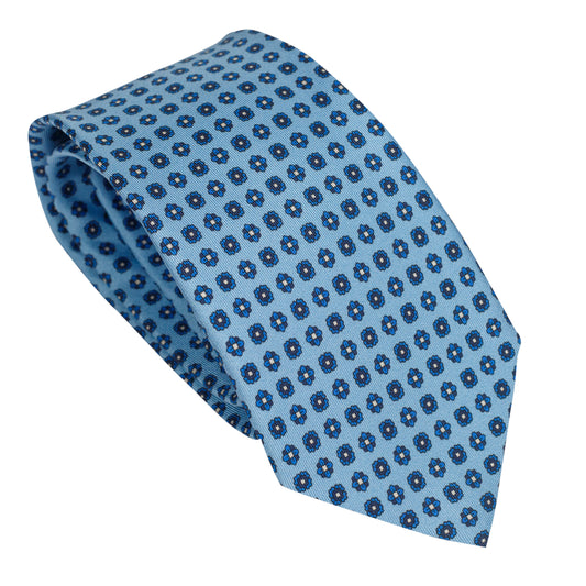 Cravatta in seta italiana 100% azzurra con motivo micro floreale
