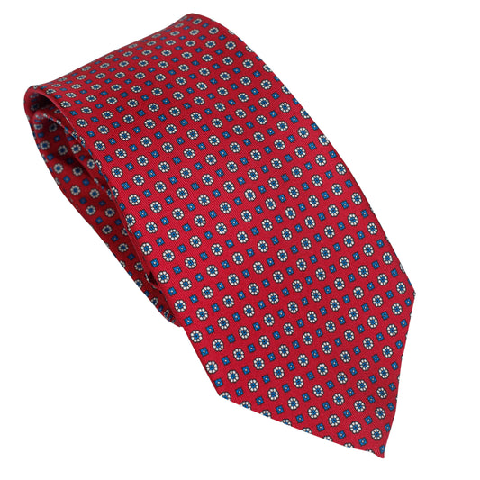 Cravatta classica rossa in seta italiana al 100% con motivo micro geometrico blu