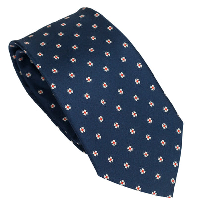 Cravatta blu scuro in seta italiana al 100% con motivo a rosetta micro floreale