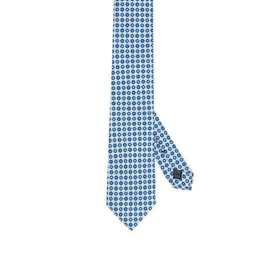 Cravatta in seta italiana al 100% celeste con motivo floreale micro blu