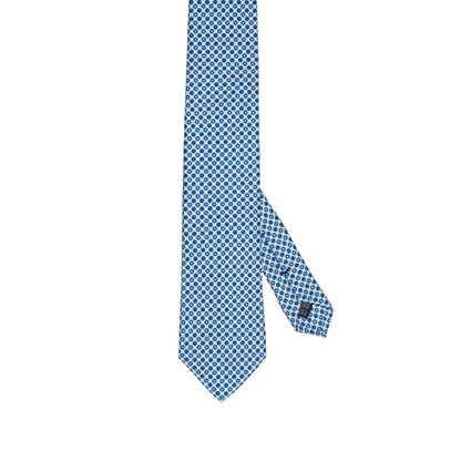 Cravatta in seta italiana al 100% azzurra con motivo circolare blu