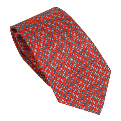 Cravatta in seta italiana al 100% rosso intenso con motivo a quadri floreali blu