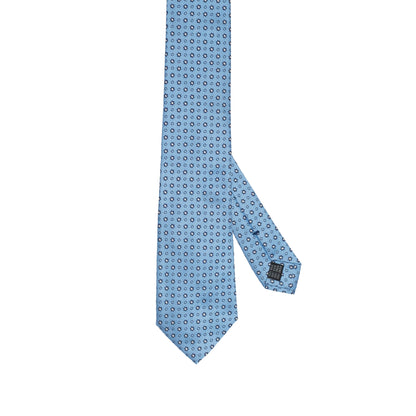Cravatta in seta italiana al 100% azzurra con motivo floreale micro blu