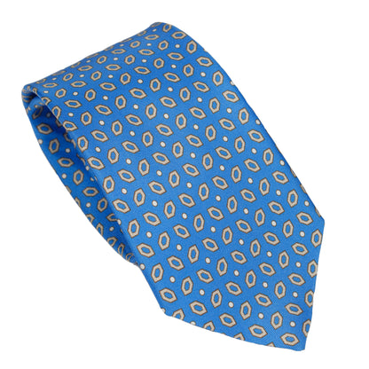 Cravatta in seta italiana al 100%, colore azzurro brillante, con motivo ovale ripetuto