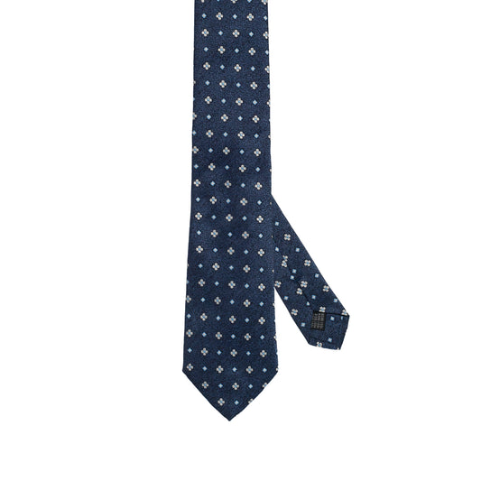 Cravatta blu notte in seta italiana al 100% con motivo floreale micro blu