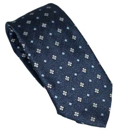 Cravatta blu notte in seta italiana al 100% con motivo floreale micro blu