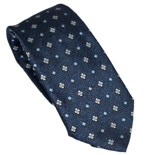 Cravatta blu notte in seta italiana al 100% con motivo floreale micro blu