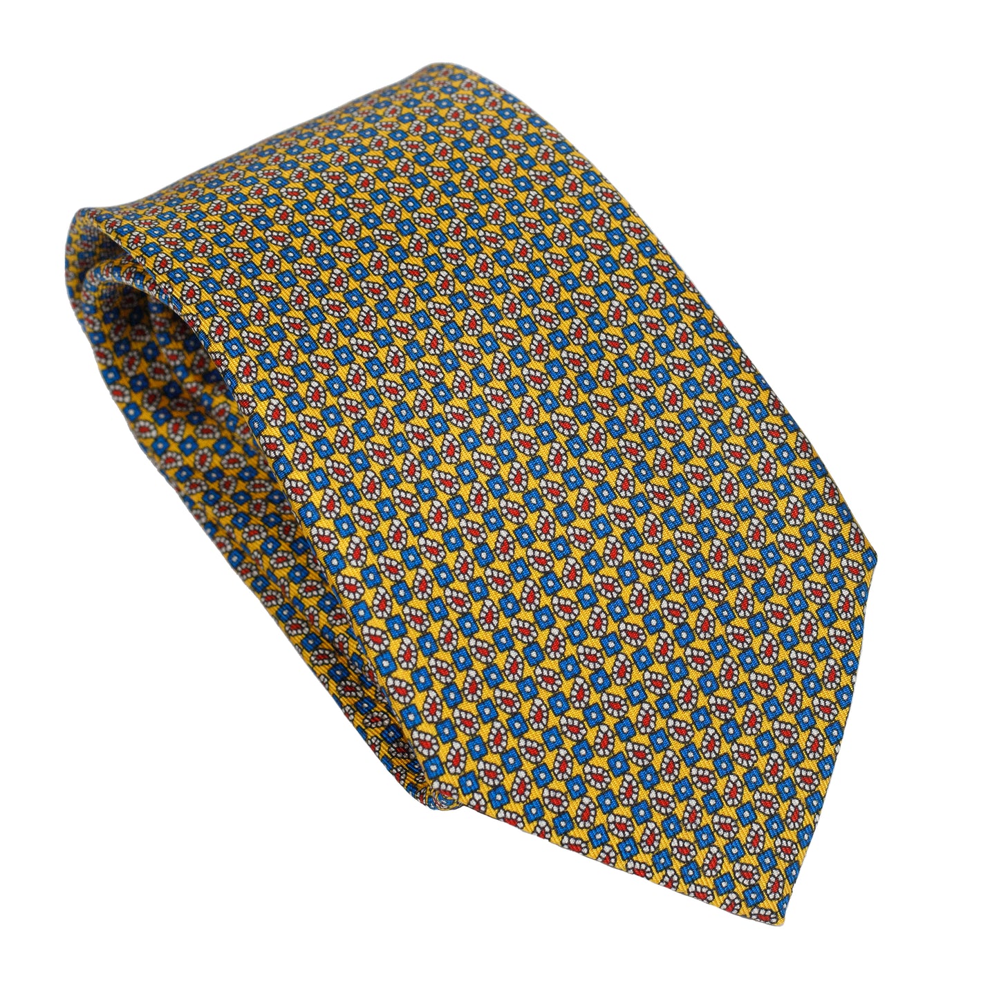 Cravatta in seta italiana al 100% giallo bruciato con motivo micro geometrico verde acqua a contrasto