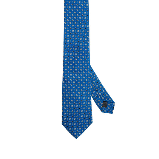 Cravatta in seta italiana al 100% blu brillante con motivo floreale bianco micro