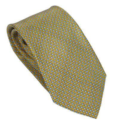 Cravatta in pura seta italiana al 100% giallo ocra con motivo floreale blu