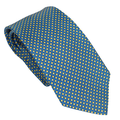 Cravatta in seta italiana 100% azzurra con motivo micro geometrico giallo
