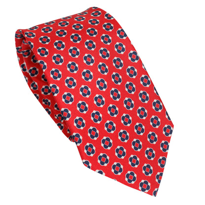 Cravatta in seta italiana al 100% rosso brillante con motivo geometrico blu navy e avorio